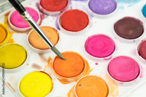 watercolour paints and brushes