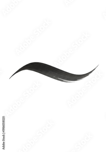 A dynamic abstract calligraphic swoosh in deep charcoal grey ink, captured in a macro flat lay with dry brush texture on transparent. concept for graphic design element.