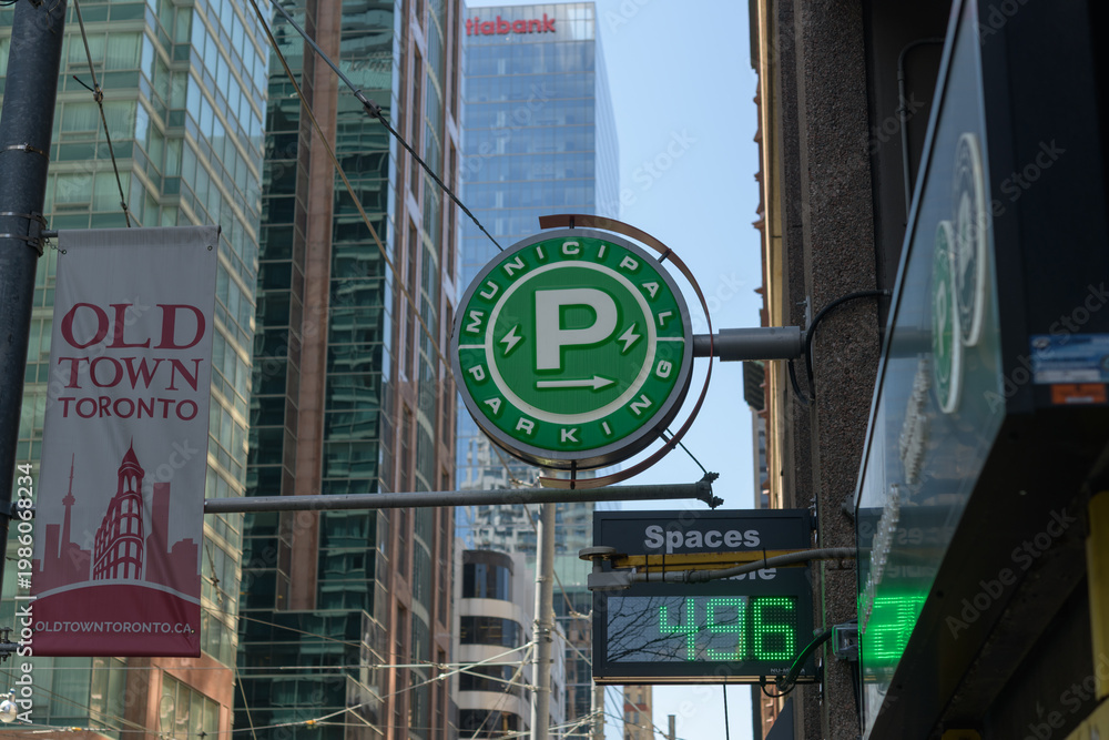 Obraz premium wall mounted projecting sign at Municipal Parking lot, 40 Richmond St E, Toronto