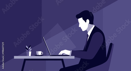Businessman working diligently on laptop in modern office