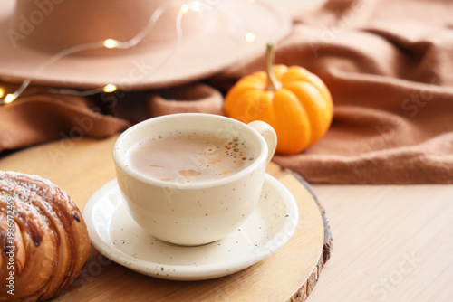 Cup of pumpkin coffee with ...
