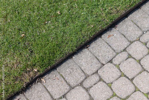 grass and block pavement