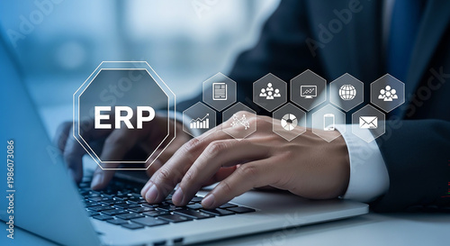 ERP Mastery: A professional, deeply engrossed in their work, types on a laptop, surrounded by a digitally rendered network of interconnected icons.