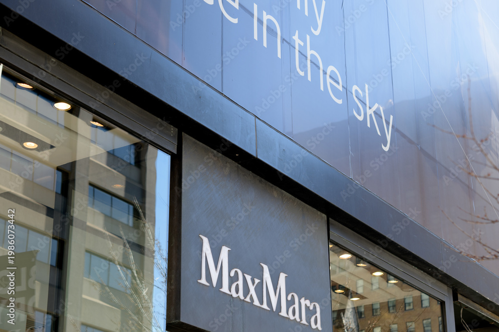 Fototapeta premium sign outside Max Mara, a women's clothing store, located at 151 Bloor St W, Toronto