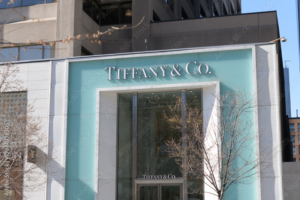 Fototapeta premium exterior building facade and sign of Tiffany & Co, a jewelry store, located at 150 Bloor St W, inside 89 Avenue Yorkville, Toronto