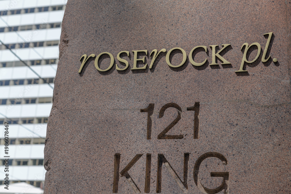 Obraz premium granite pylon sign outside Roserock Place at 121 King St W, Toronto