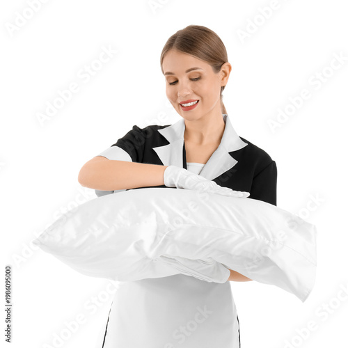 Pretty chambermaid with pil...