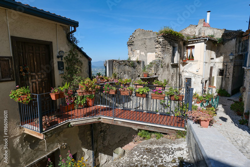 A narrow street among the houses of Guardia Sanframondi, a medieval town in Campania, Italy.