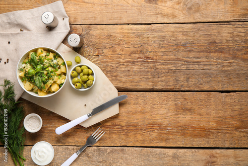 Bowl of tasty potato salad ...