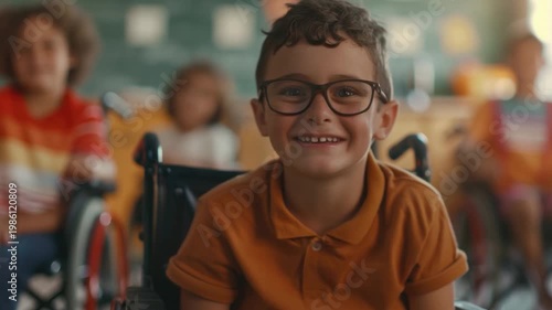 A happy young boy with a disability smiling directly into the camera