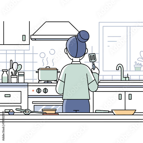 Woman cooking in a modern kitchen.