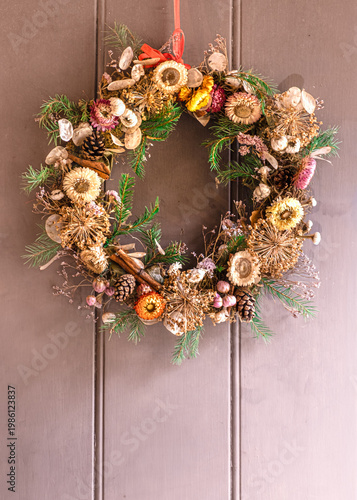 A Christmas Wreath On English Country House Kitchen Door