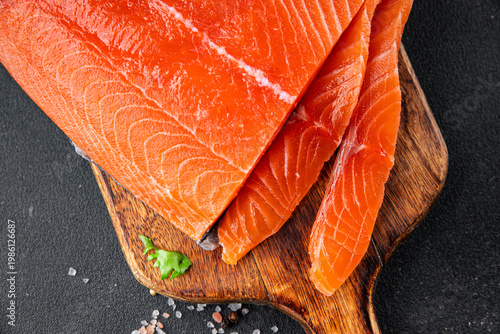 Salmon fresh fish lightly salted red fish seafood tasty snack fresh gourmet food background on the table rustic food top view copy space vegetarian food pescetarian diet