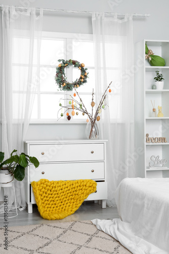 Interior of light bedroom w...