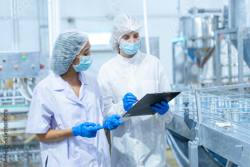 Food and manufacturing researchers oversee seafood production lines in tightly controlled factories where machinery is used to produce and cook food before it is shipped out.