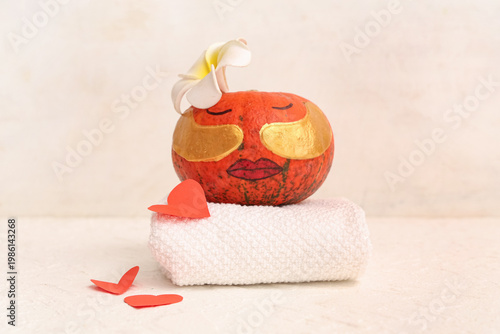 Pumpkin with drawn face, un...
