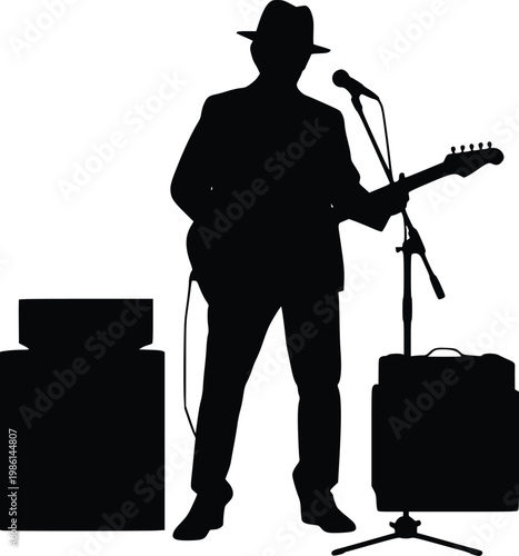 Silhouette of a musician playing guitar and singing