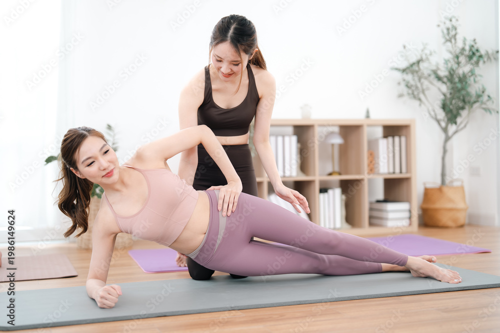 Obraz premium Exercise yoga woman trainer fitness mat pose studio stretching body