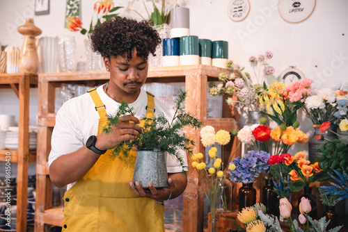 Florist arranges plant in f...