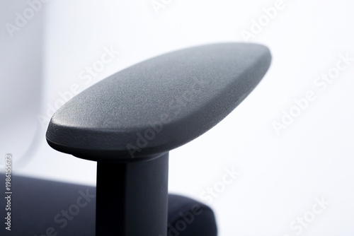 Press the leather seat armrest with your hand