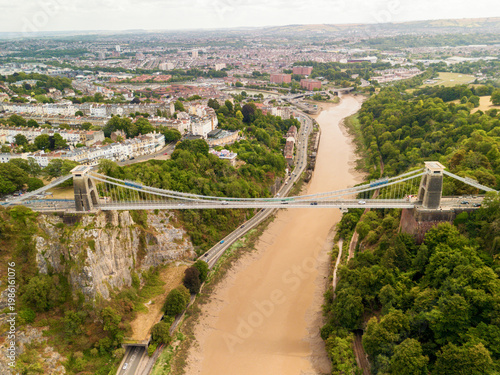 Bristol UK: 28th July 2025: Drone view of Clifton Suspension Bridge under restoration with scaffolding over the River Avon (Avon Gorge)