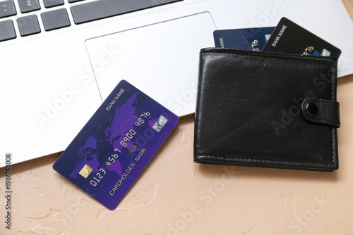 Laptop with leather wallet ...