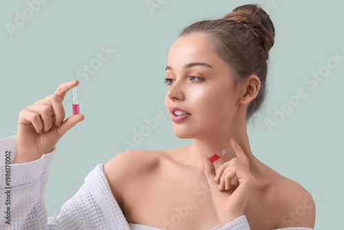 Beautiful young woman with ...