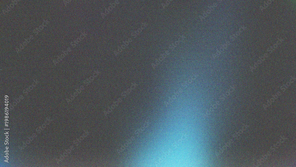 Fototapeta premium Intense blue light beam illuminating a dark grainy gradient abstract creating a focused and dramatic effect