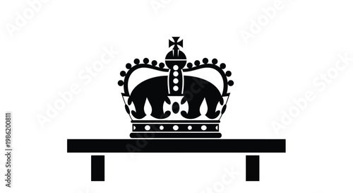 A regal crown rests on a table distinct black silhouette