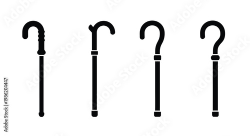 Four vintage walking sticks presented in a stark black silhouette