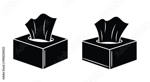 Two black tissue boxes presented in a striking silhouette