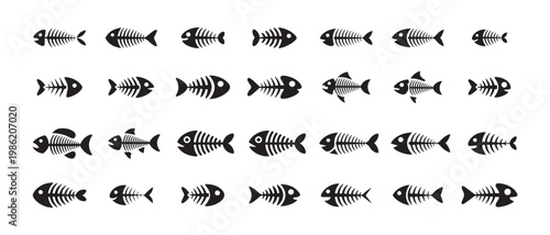 Collection of thirty two fish skeleton icons presenting different anatomical styles and bone structure details