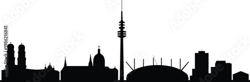 silhouette of historic city skyline at dusk with iconic tower and sunset glow