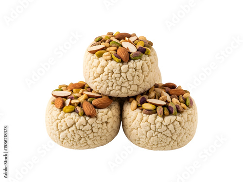 Three Indian sweets with nuts on top isolated on white background for food designs transparent background