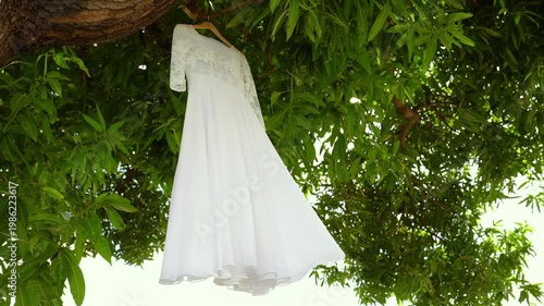 Slow Motion Close-Up Tracking Shot of Wedding Dress Fabric Moving with Light and Air