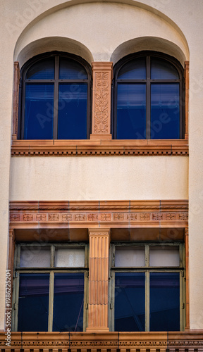 Antique Mediterranean Architecture on a Vintage Building with a Neglected Exterior.