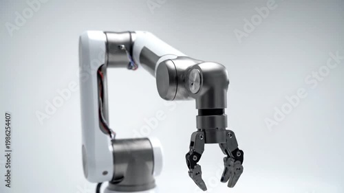 Industrial robotic arm with metal gripper.