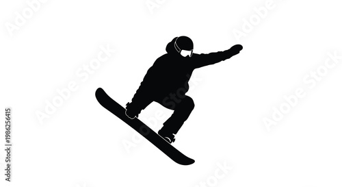 Silhouette of a snowboarder performing a trick in mid air