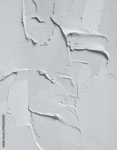 Coarse construction plaster texture, irregular unfinished plaster wall