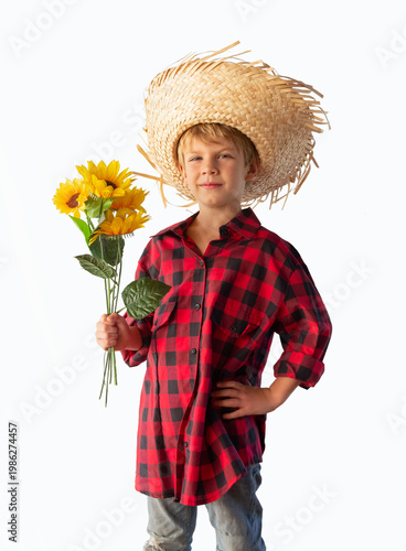 Boy dressed for the June festivals in Brazil with a straw hat and plaid shirt. Isolated.