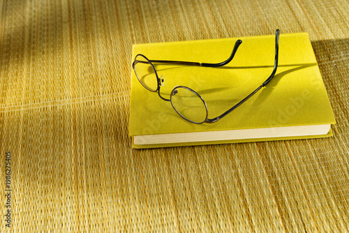 Glasses on book