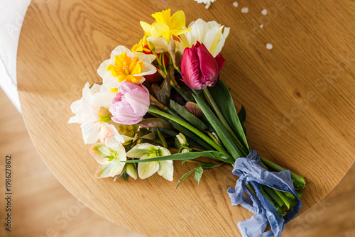 Happy Mothers day! Beautiful bouquet on wooden table flat lay. Holiday greetings with space for text. International women's day. Valentine's day