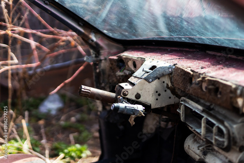 Decayed vehicle ambiance. Derelict automobile interior showing signs of decay and neglect