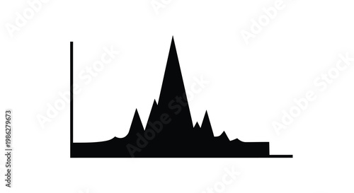 Black silhouette of a mountain range with jagged peaks
