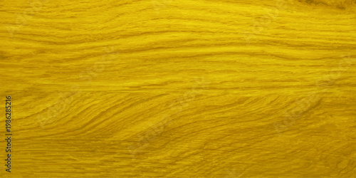 Bright yellow wood grain texture background with natural wavy patterns and golden hues