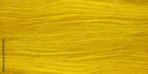 Bright yellow wood grain texture background with natural wavy patterns and golden hues