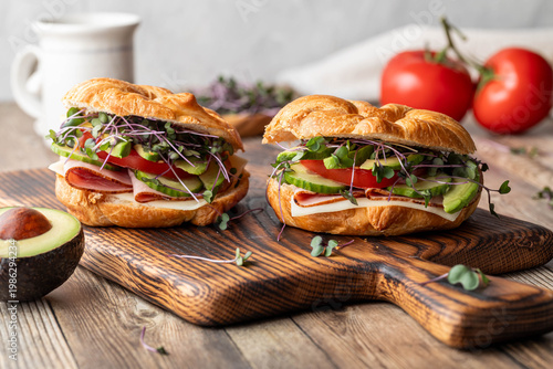 Freshly made croissant sandwiches stuffed with healthy ingredients.