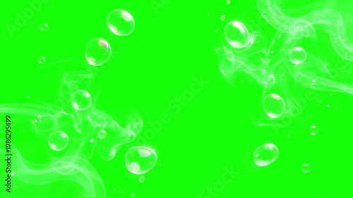A video showcasing clear bubbles floating on a vibrant green liquid surface
