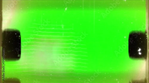 A video showcasing a vibrant green abstract background with black squares and a unique thermal pattern