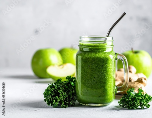 Healthy green detox smoothie in a glass jar, featuring fresh kale, crisp green apples, and pungent ginger. A nutritious and energizing beverage for a balanced lifestyle